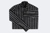 Black button-up with stud pinstripe print, slim fit — on model